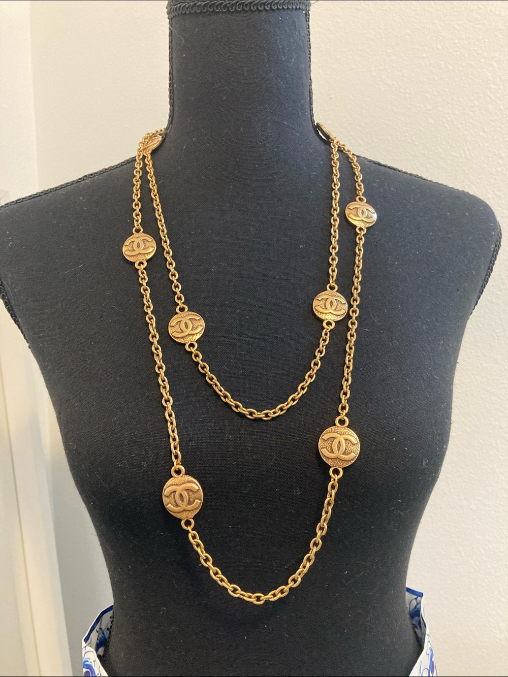 CHANEL Gold-Tone Double Strand Logo Medallion Necklace